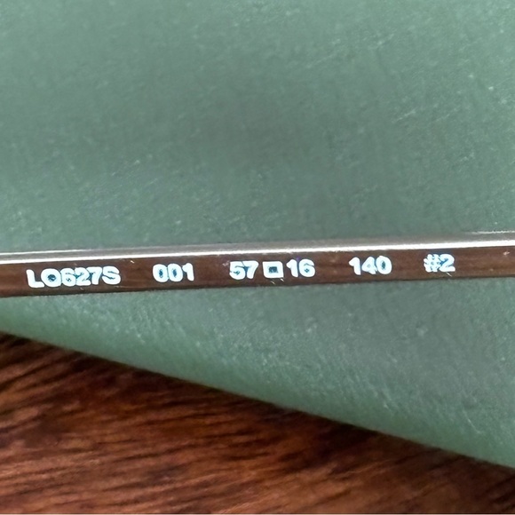 Longchamp LO627S 001 Black Gold Cat Eye Sunglasses 57-16-140 Gradient Lens main image 4